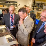 Senior research scientist at Xerox Research Centre of Canada, demonstrates the printing of electronic circuitry using a Xerox ink composed of metal nanoparticles to Minister of State Rickford